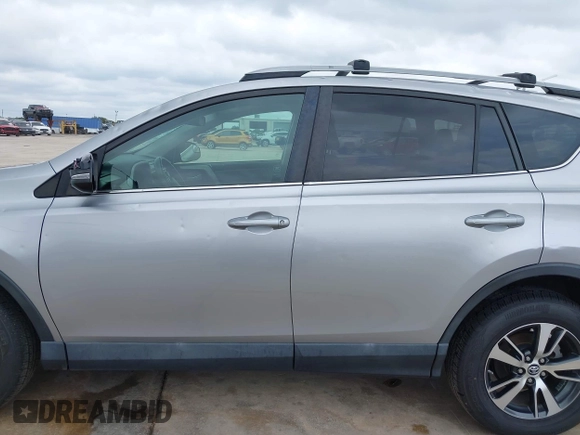 2017 Toyota RAV4 XLE with VIN 2T3WFREV3HW321796, listed as a IAAI auction lot 42080479 with 104,014 mi miles and . Bid and sale history available at DreamBid. Image 14.