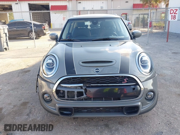 2020 MINI Hardtop Cooper S z VIN WMWXR5C00L2M23924, wystawiony jako IAAI lot #41520706 z przebiegiem 123 006 mil mil oraz . Historia ofert i sprzedaży dostępna na DreamBid. Obrazek 6.
