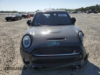 2020 MINI Hardtop 4 Door Cooper S z VIN WMWXU9C02L2M29164, wystawiony jako Copart lot #53538275 z przebiegiem 60 076 mil mil oraz Szkody całkowita. Historia ofert i sprzedaży dostępna na DreamBid. Obrazek 5.