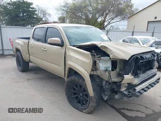2016 Toyota Tacoma SR5 with VIN 3TMDZ5BN3GM003351, listed as a IAAI auction lot 41721932 with 100,774 mi miles. Bid and sale history available at carsss.com. Image 1.