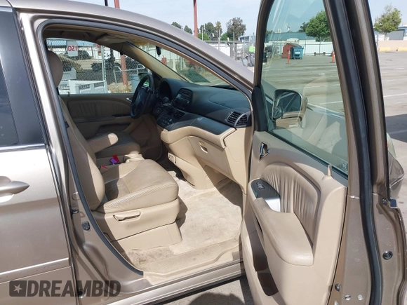 2005 Honda Odyssey EX-L z VIN 5FNRL38615B407908, wystawiony jako IAAI lot #42076045 z przebiegiem 170 950 mil mil oraz . Historia ofert i sprzedaży dostępna na DreamBid. Obrazek 5.