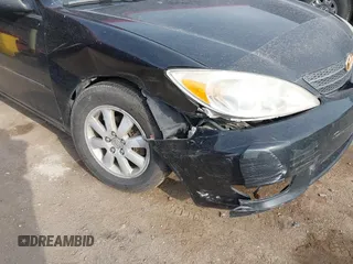 2003 Toyota Camry LE with VIN 4T1BE32K33U176270, listed as a IAAI auction lot 41995146 with 223,032 mi miles and . Bid and sale history available at DreamBid. Image 6.