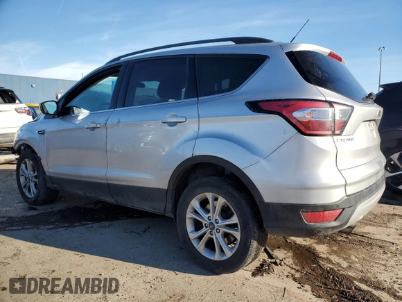 2017 Ford Escape SE with VIN 1FMCU0GD0HUD58001, listed as a Copart auction lot 42311265 with 85,787 mi miles and Clean Title. Bid and sale history available at DreamBid. Image 2.