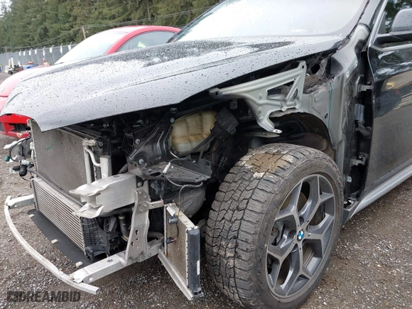 2018 BMW X1 xDrive28i with VIN WBXHT3C39J3H30531, listed as a IAAI auction lot 41890734 with 59,147 mi miles. Bid and sale history available at carsss.com. Image 20.