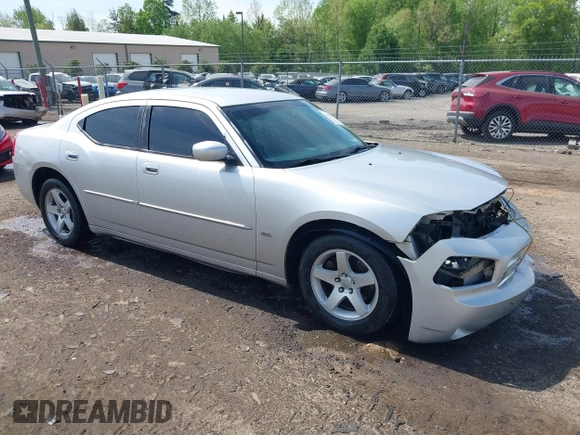 2010 Dodge Charger SXT with VIN 2B3CA3CV9AH311637, listed as a IAAI auction lot 42079657 with 187,683 mi miles. Bid and sale history available at carsss.com. Image 1.