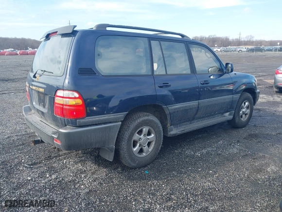 2002 Toyota Land Cruiser with VIN JTEHT05J122018974, listed as a IAAI auction lot 41543290 with 266,926 mi miles. Bid and sale history available at carsss.com. Image 4.
