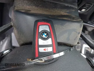 2015 BMW 4 Series 428i xDrive with VIN WBA3N5C56FK198340, listed as a IAAI auction lot 42153190 with 96,054 mi miles and . Bid and sale history available at DreamBid. Image 11.