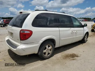 2005 Dodge Caravan SXT z VIN 2D4GP44L15R380469, wystawiony jako Copart lot #58800775 z przebiegiem Nie podano mil oraz Szkoda całkowita • Salvage title. Historia ofert i sprzedaży dostępna na DreamBid. Obrazek 3.
