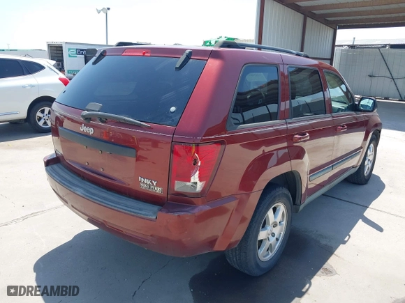 2009 Jeep Grand Cherokee Laredo with VIN 1J8GS48K39C521160, listed as a IAAI auction lot 42039577 with 262,829 mi miles. Bid and sale history available at carsss.com. Image 4.