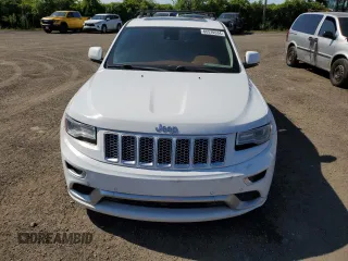 2015 Jeep Grand Cherokee Summit with VIN 1C4RJFJM3FC731831, listed as a Copart auction lot 66570534 with 230,193 mi miles and Clean title. Bid and sale history available at DreamBid. Image 5.