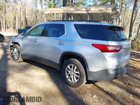 2020 Chevrolet Traverse LT Cloth with VIN 1GNERGKW4LJ215277, listed as a IAAI auction lot 41706394 with 84,762 mi miles. Bid and sale history available at carsss.com. Image 3.