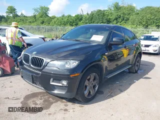 2014 BMW X6 xDrive35i with VIN 5UXFG2C5XE0C43526, listed as a IAAI auction lot 42121122 with 199,564 mi miles. Bid and sale history available at carsss.com. Image 2.