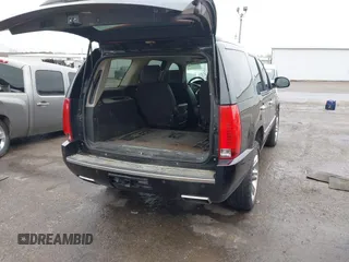 2014 Cadillac Escalade Platinum z VIN 1GYS4DEF9ER212880, wystawiony jako IAAI lot #41954880 z przebiegiem 193 203 mil mil oraz . Historia ofert i sprzedaży dostępna na DreamBid. Obrazek 4.