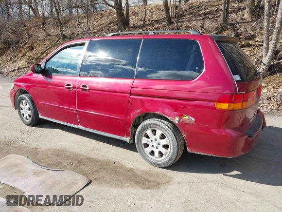 2003 Honda Odyssey EX-L with VIN 5FNRL18923B130410, listed as a IAAI auction lot 41814211 with 209,335 mi miles and . Bid and sale history available at DreamBid. Image 3.