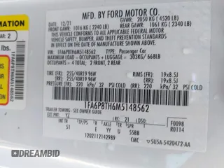 2021 Ford Mustang EcoBoost with VIN 1FA6P8TH6M5148562, listed as a IAAI auction lot 42147236 with 57,050 mi miles and . Bid and sale history available at DreamBid. Image 9.