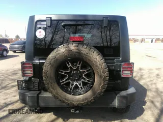 2018 Jeep Wrangler Unlimited Sport S with VIN 1C4BJWDGXJL811661, listed as a IAAI auction lot 42002611 with 86,105 mi miles and . Bid and sale history available at DreamBid. Image 16.