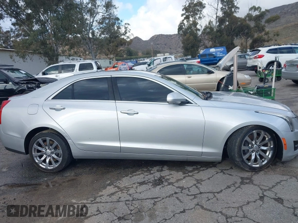2018 Cadillac ATS Luxury RWD z VIN 1G6AB5RX6J0110860, wystawiony jako IAAI lot #41556662 z przebiegiem 63 886 mil mil oraz . Historia ofert i sprzedaży dostępna na DreamBid. Obrazek 14.