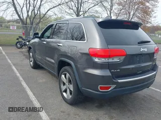 2016 Jeep Grand Cherokee Limited 75th Anniversary with VIN 1C4RJFBG5GC497766, listed as a IAAI auction lot 42048662 with 164,281 mi miles and . Bid and sale history available at DreamBid. Image 3.