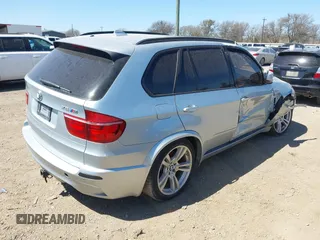 2011 BMW X5 M with VIN 5YMGY0C53BLK26167, listed as a IAAI auction lot 41742529 with 118,777 mi miles. Bid and sale history available at carsss.com. Image 4.