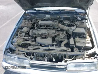 1988 Mazda 626 z VIN JM1GD2221J1550574, wystawiony jako IAAI lot #42415062 z przebiegiem 190 747 mil mil oraz . Historia ofert i sprzedaży dostępna na DreamBid. Obrazek 10.