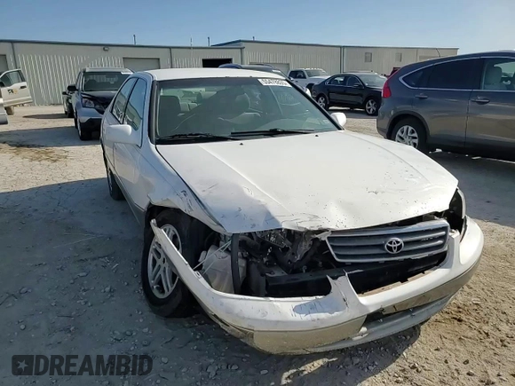 2000 Toyota Camry CE z VIN JT2BG28K8Y0467211, wystawiony jako Copart lot #55478835 z przebiegiem Nie podano mil oraz Szkoda całkowita • Salvage title. Historia ofert i sprzedaży dostępna na DreamBid. Obrazek 13.