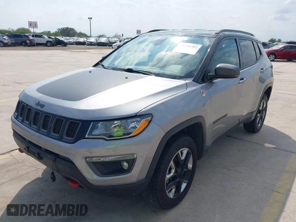 2018 Jeep Compass Trailhawk z VIN 3C4NJDDB5JT451192, wystawiony jako IAAI lot #42378382 z przebiegiem 132 667 mil mil oraz . Historia ofert i sprzedaży dostępna na DreamBid. Obrazek 2.