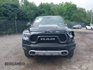 2019 Ram 1500 Rebel z VIN 1C6SRFLT1KN784936, wystawiony jako IAAI lot #42375986 z przebiegiem 78 539 mil mil oraz . Historia ofert i sprzedaży dostępna na DreamBid. Obrazek 13.