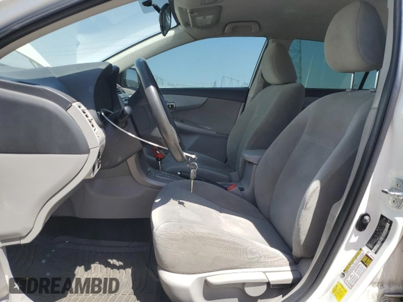 2012 Toyota Corolla L with VIN 2T1BU4EE7CC815816, listed as a Copart auction lot 54789165 with 246,316 mi miles and Salvage Title. Bid and sale history available at DreamBid. Image 7.