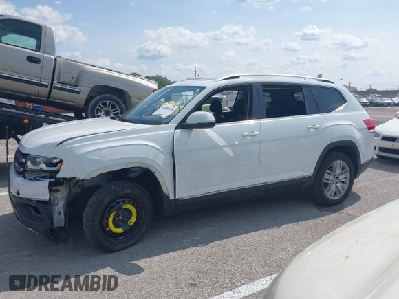 2019 Volkswagen Atlas SEL with VIN 1V2ER2CA0KC512305, listed as a IAAI auction lot 42400428 with 137,516 mi miles and . Bid and sale history available at DreamBid. Image 14.