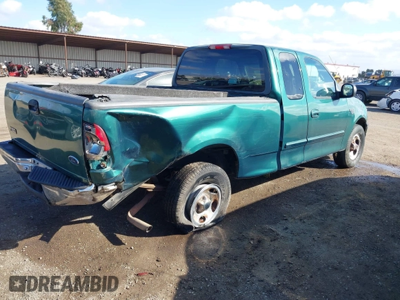 2000 Ford F-150 XL with VIN 1FTRX17L0YKA94650, listed as a IAAI auction lot 41720452 with 112,013 mi miles. Bid and sale history available at carsss.com. Image 4.
