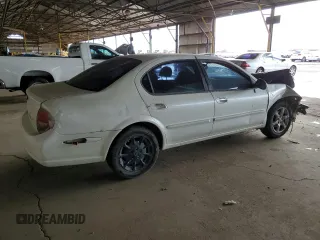 2001 Nissan Maxima GXE with VIN JN1CA31D41T809212, listed as a Copart auction lot 57845405 with 244,502 mi miles and Salvage title. Bid and sale history available at DreamBid. Image 3.