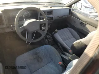1993 Nissan Frontier SE z VIN 1N6HD16Y9PC398809, wystawiony jako Copart lot #70628754 z przebiegiem 224 511 mil mil oraz Szkoda całkowita • Salvage title. Historia ofert i sprzedaży dostępna na DreamBid. Obrazek 8.