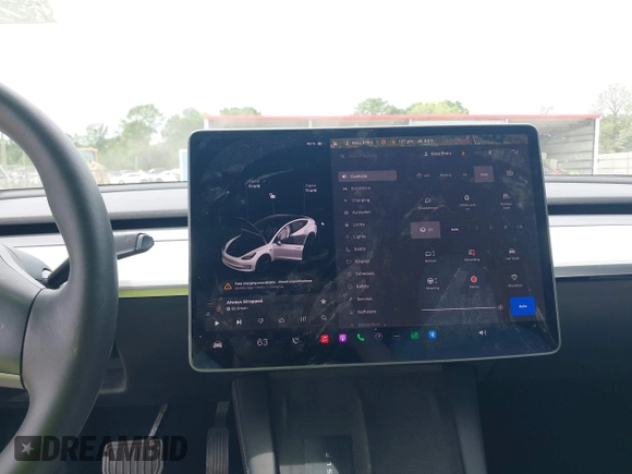 2021 Tesla Model 3 Long Range z VIN 5YJ3E1EB1MF975824, wystawiony jako IAAI lot #42146968 z przebiegiem 97 570 mil mil oraz . Historia ofert i sprzedaży dostępna na DreamBid. Obrazek 19.