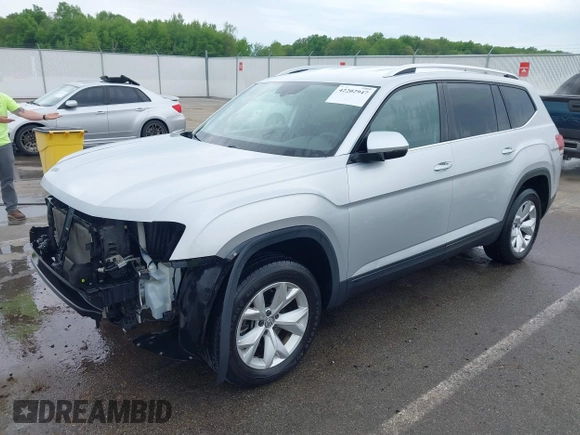 2018 Volkswagen Atlas SE with VIN 1V2KR2CA5JC570959, listed as a IAAI auction lot 42202947 with 122,134 mi miles and . Bid and sale history available at DreamBid. Image 21.