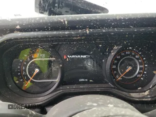 2024 Jeep Wrangler Willys with VIN 1C4PJXDG5RW350147, listed as a Copart auction lot 50164515 with 2,394 mi miles and Salvage title. Bid and sale history available at DreamBid. Image 9.