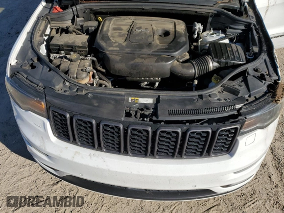 2018 Jeep Grand Cherokee High Altitude with VIN 1C4RJECG1JC125602, listed as a Copart auction lot 88702275 with 59,701 mi miles and Salvage title. Bid and sale history available at DreamBid. Image 14.
