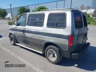1986 Chevrolet Astro z VIN 1GCDM15Z2GB143503, wystawiony jako IAAI lot #42290965 z przebiegiem Nie podano mil oraz . Historia ofert i sprzedaży dostępna na DreamBid. Obrazek 3.