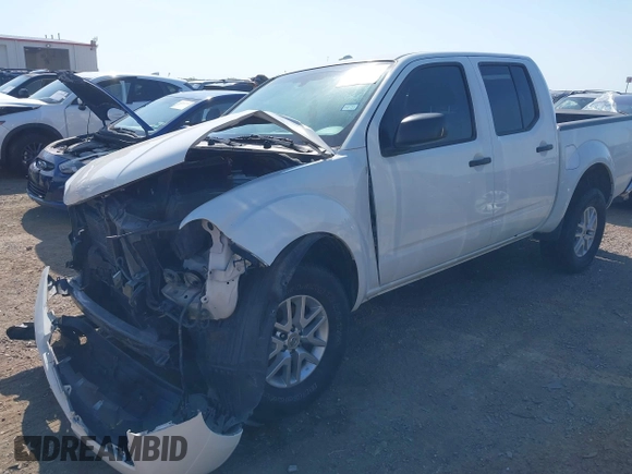 2015 Nissan Frontier S with VIN 1N6AD0EV3FN740597, listed as a IAAI auction lot 42257170 with 171,582 mi miles and . Bid and sale history available at DreamBid. Image 2.