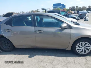 2018 Toyota Corolla L с VIN 5YFBURHEXJP845530, выставлен на аукционе IAAI как лот 42184549 с пробегом 113 379 миль миль и . История ставок и продаж доступна на DreamBid. Изображение 13.