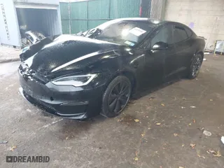 2022 Tesla Model S Plaid with VIN 5YJSA1E64NF477855, listed as a IAAI auction lot 41470591 with 1 mi miles. Bid and sale history available at carsss.com. Image 2.