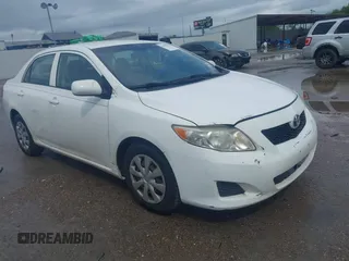 2009 Toyota Corolla z VIN JTDBL40E699049571, wystawiony jako IAAI lot #42729815 z przebiegiem 169 517 mil mil oraz . Historia ofert i sprzedaży dostępna na DreamBid. Obrazek 1.