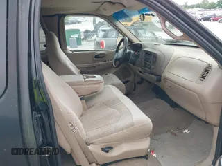 1999 Ford F-150 with VIN 1FTRX17W8XNA81054, listed as a IAAI auction lot 42234408 with Not provided miles and . Bid and sale history available at DreamBid. Image 5.
