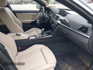 2016 BMW 4 Series 428i xDrive z VIN WBA4C9C51GG139038, wystawiony jako IAAI lot #42247629 z przebiegiem 48 388 mil mil oraz . Historia ofert i sprzedaży dostępna na DreamBid. Obrazek 5.