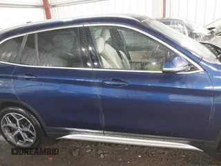 2019 BMW X1 xDrive28i z VIN WBXHT3C56K3H34720, wystawiony jako IAAI lot #42113497 z przebiegiem 64 906 mil mil oraz . Historia ofert i sprzedaży dostępna na DreamBid. Obrazek 13.