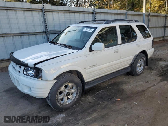 2000 Isuzu Rodeo S z VIN 4S2CK58W8Y4340907, wystawiony jako Copart lot #79683804 z przebiegiem 153 419 mil mil oraz Szkoda całkowita • Salvage title. Historia ofert i sprzedaży dostępna na DreamBid. Obrazek 1.