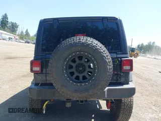 2018 Jeep Wrangler Unlimited Sport S with VIN 1C4HJXDN1JW216825, listed as a IAAI auction lot 42405799 with 37,194 mi miles and . Bid and sale history available at DreamBid. Image 16.