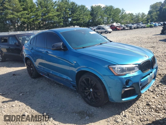 2017 BMW X4 M40i with VIN 5UXXW7C58H0U25599, listed as a Copart auction lot 61489334 with 115,001 mi miles and Salvage Title. Bid and sale history available at carsss.com. Image 4.