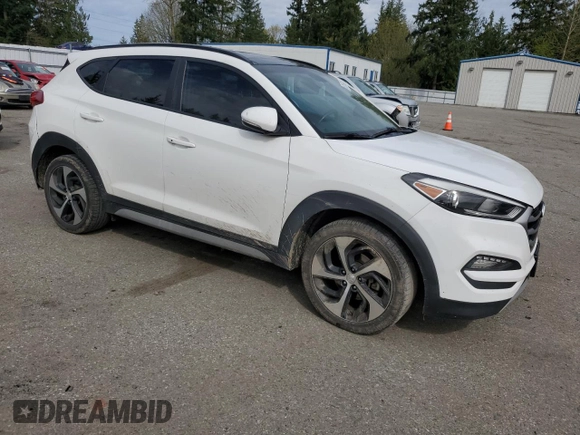 2017 Hyundai Tucson Sport with VIN KM8J3CA25HU570945, listed as a Copart auction lot 52555265 with 124,192 mi miles and Salvage Title. Bid and sale history available at DreamBid. Image 4.
