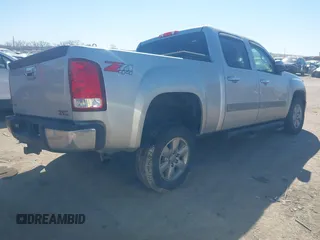 2010 GMC Sierra 1500 SLT z VIN 3GTRKWE30AG232120, wystawiony jako IAAI lot #41681642 z przebiegiem 156 058 mil mil oraz . Historia ofert i sprzedaży dostępna na DreamBid. Obrazek 4.