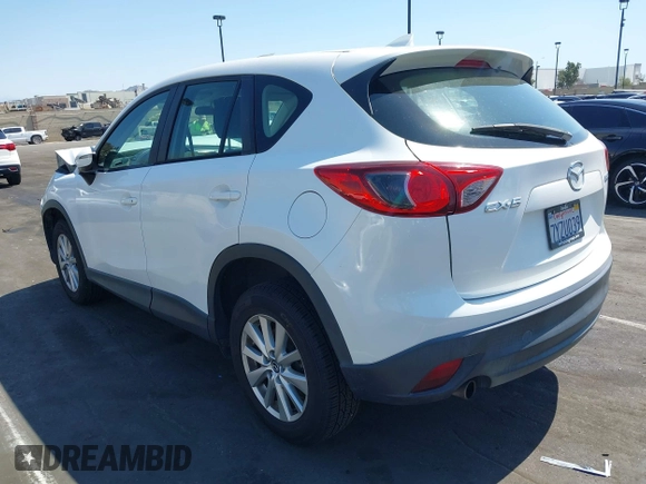 2016 Mazda CX-5 Sport with VIN JM3KE2BY9G0825285, listed as a IAAI auction lot 41841833 with 96,915 mi miles. Bid and sale history available at carsss.com. Image 3.